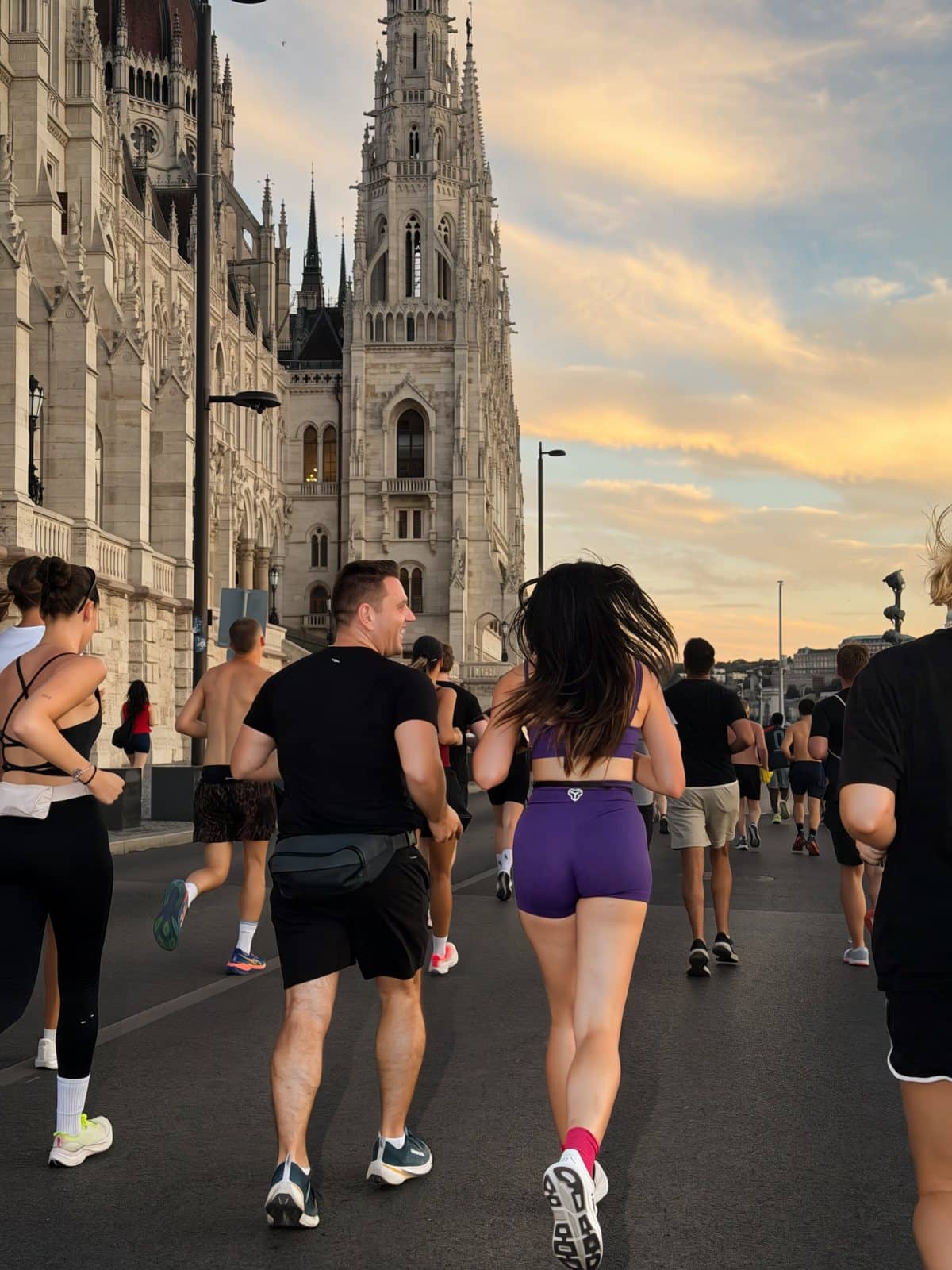 Runners on Social Tuesday passing St. Stephen's Basilica