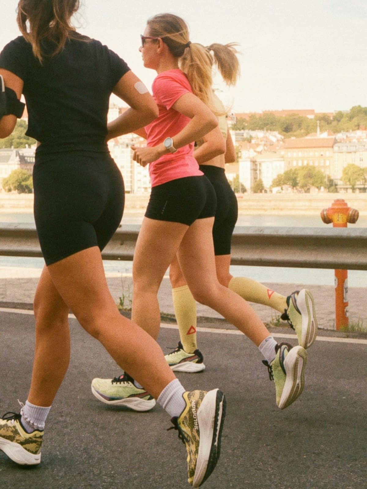 Three runners on a Sunday long run by the Danube